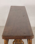 Lengthwise view of the narrow plank top on the Chinese console table