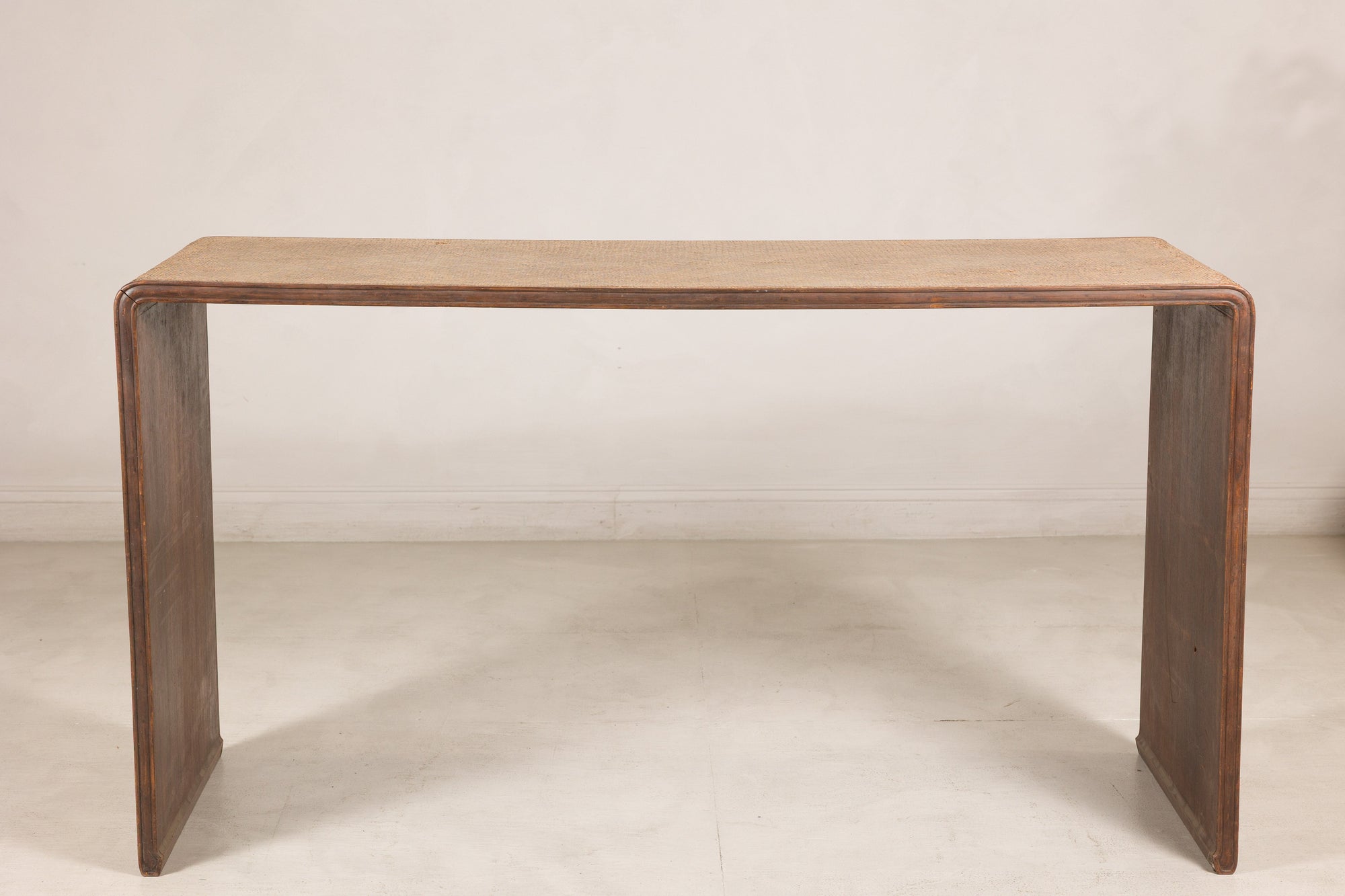Alternate front view of the rectangular rattan waterfall console
