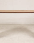 Front view of the rattan and wood waterfall console table