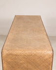 Close-up of the woven rattan tabletop and rounded waterfall edge