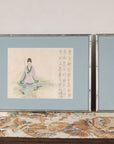 Close view of paired silvered frames and Japanese figure studies
