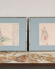 Front view of two Japanese figural prints with pale blue mats