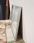 Alternate side profile of the paired silvered picture frames