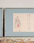 Close view emphasizing the standing figure print and calligraphy