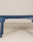 Blue painted wood narrow bench angled view