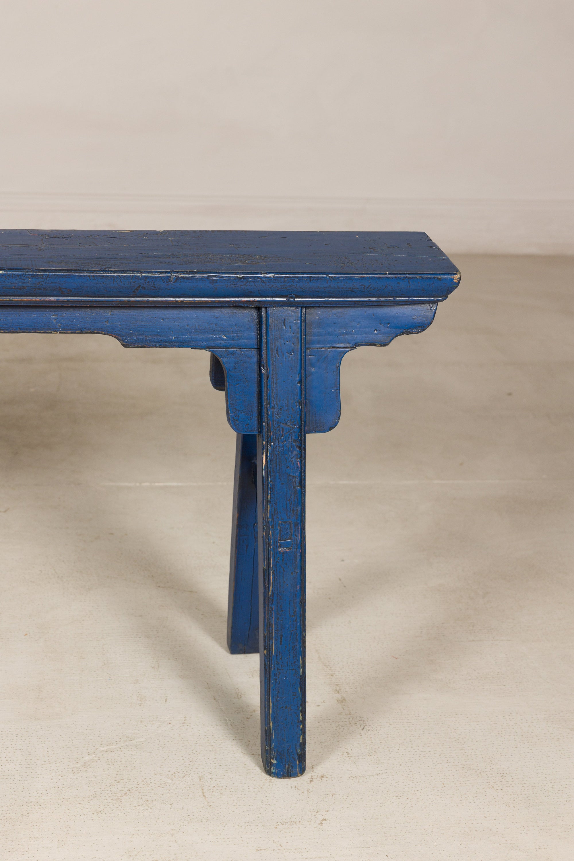 Blue painted wood narrow bench top view