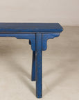Blue painted wood narrow bench top view