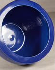 Angled view of the cobalt blue planter interior and wide rolled rim