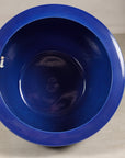 Top view into the deep blue glazed interior of the ceramic planter