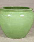 Apple green glazed ceramic planter surface detail