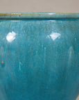 Turquoise glazed stoneware planter side view