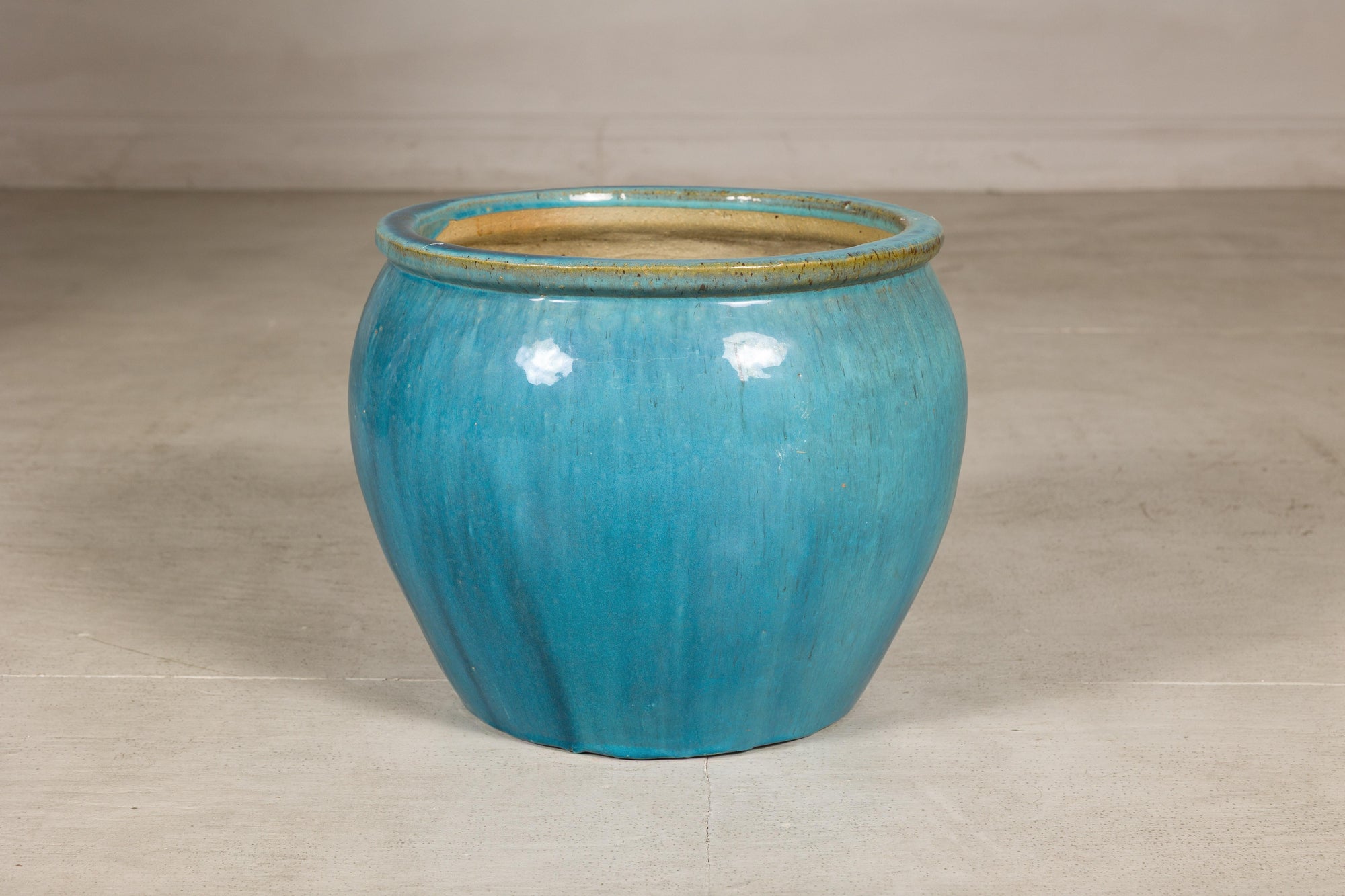 Turquoise glazed stoneware planter top view