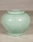 Alternate angled view of the rounded celadon ginger jar form vase