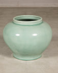 Right angled view of the celadon vase and open mouth