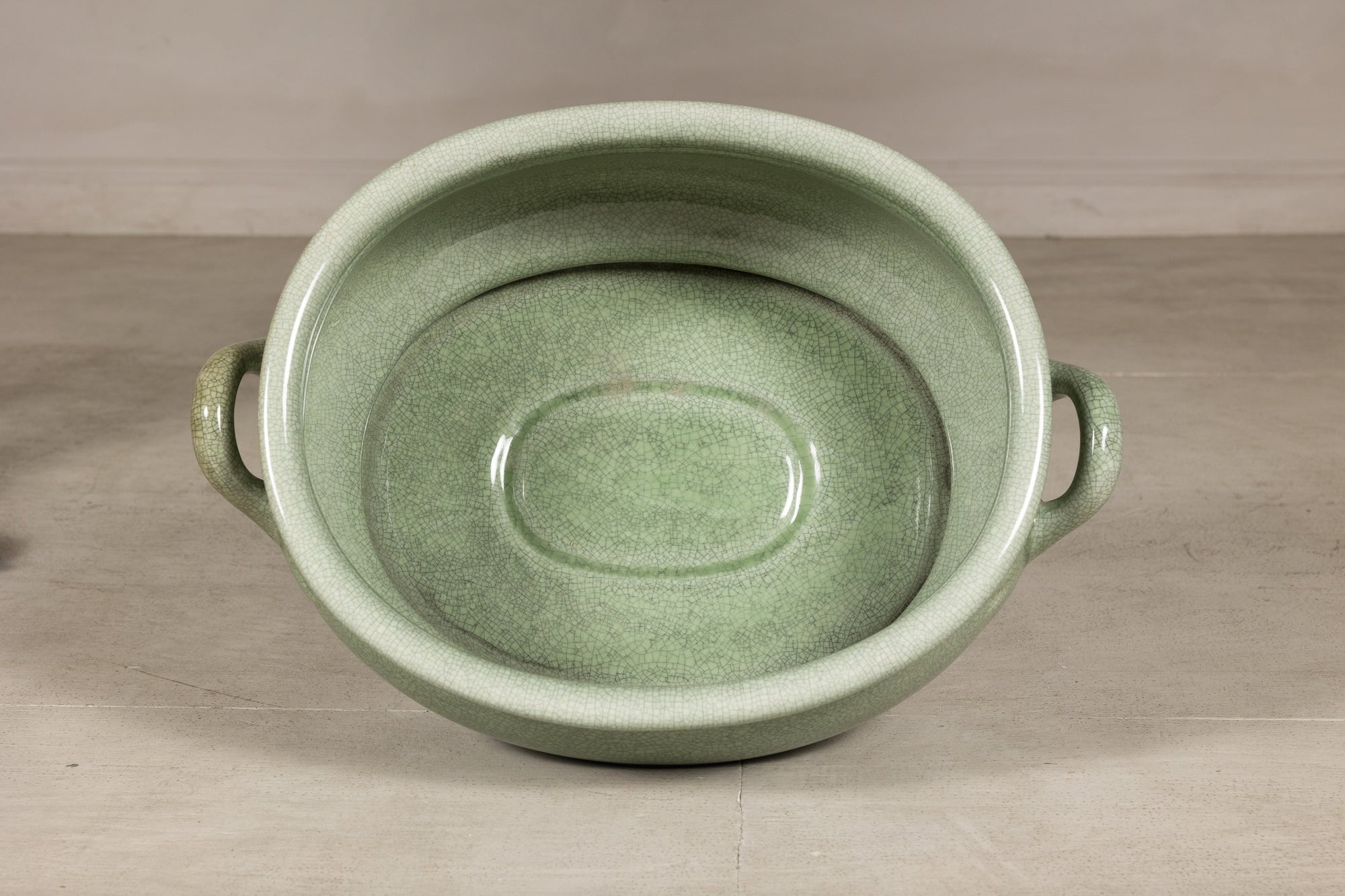 Top view into the oval celadon footbath and recessed interior base