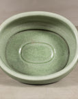 Top view into the oval celadon footbath and recessed interior base