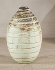 Cream marbled ceramic vase with brown bands.