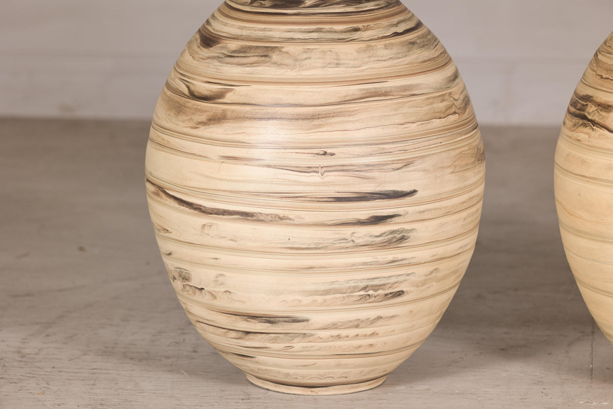 Large cream and brown glazed artisan ceramic floor vase, glaze pattern view