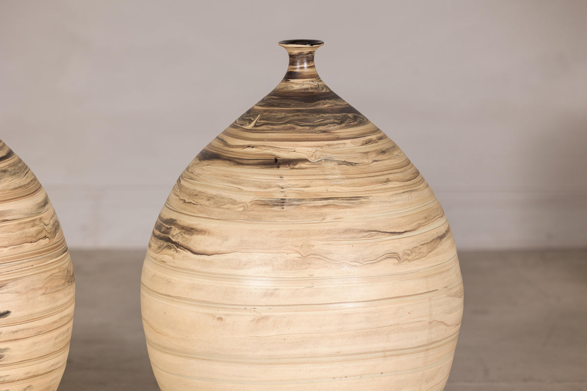Large cream and brown glazed artisan ceramic floor vase, surface detail