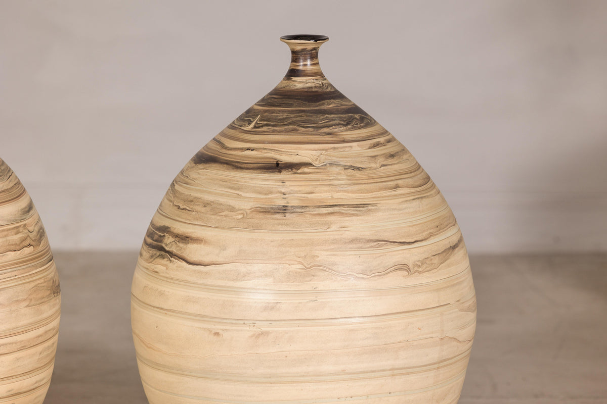 Large cream and brown glazed artisan ceramic floor vase, unglazed foot detail