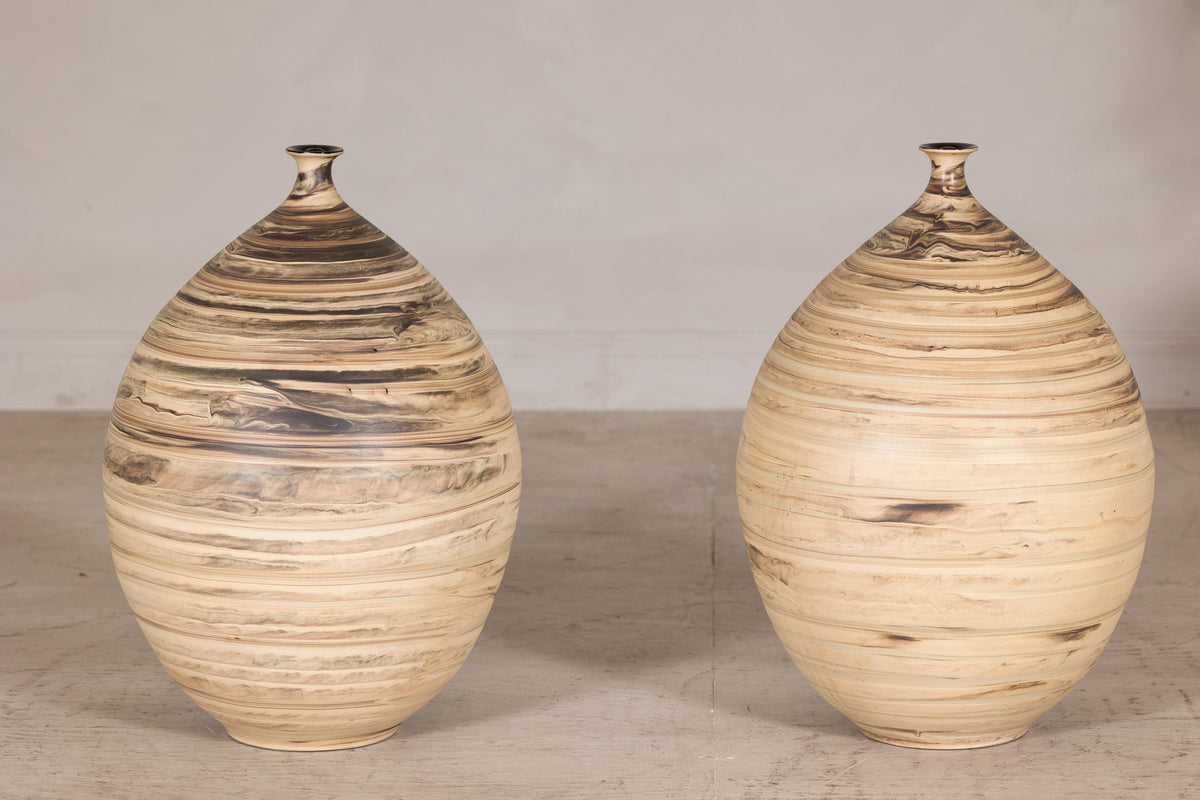 Large cream and brown glazed artisan ceramic floor vase, additional surface detail