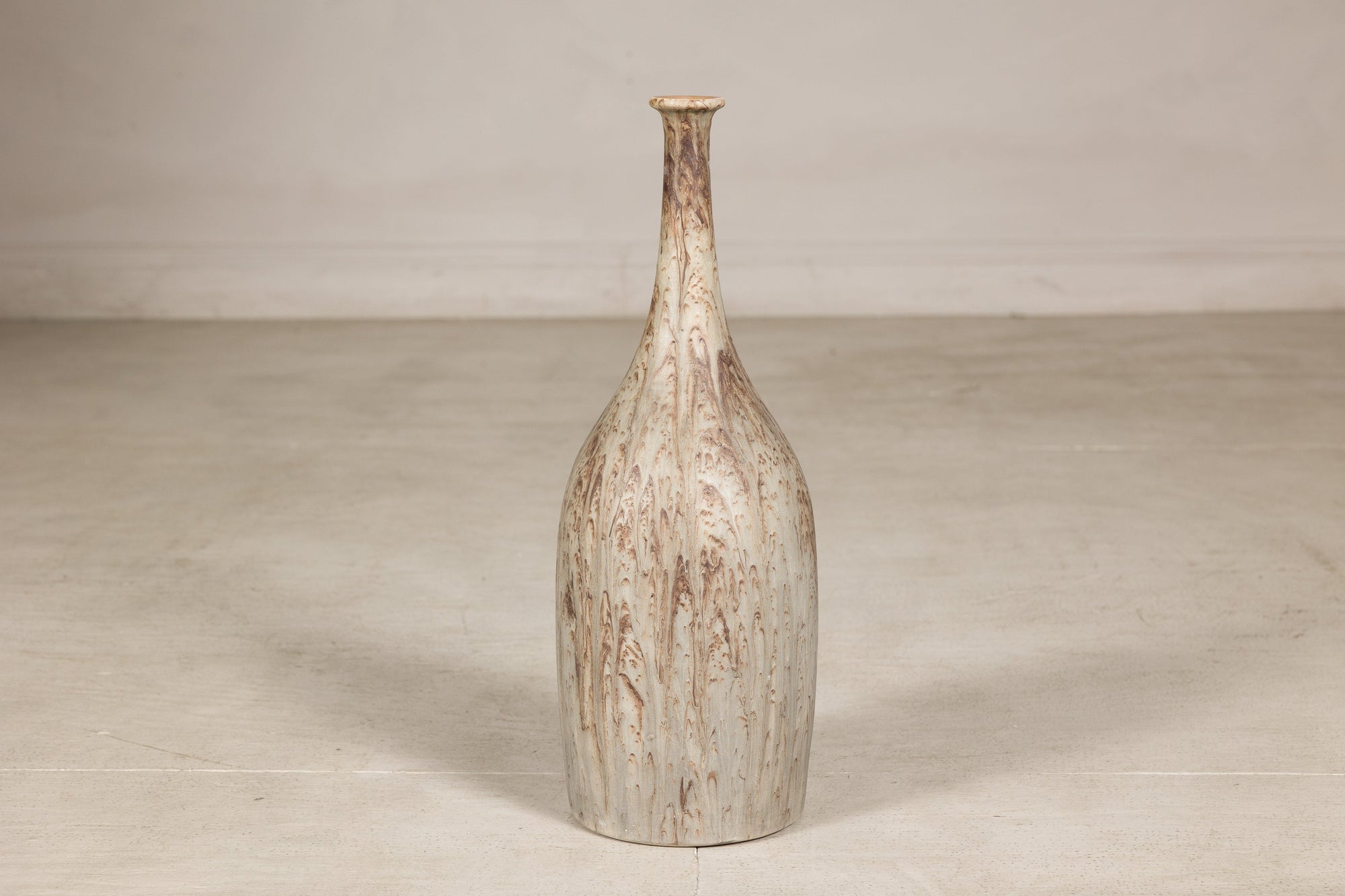 Cream and brown glazed ceramic bottle vase base view