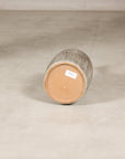 Cream and brown glazed ceramic bottle vase construction detail