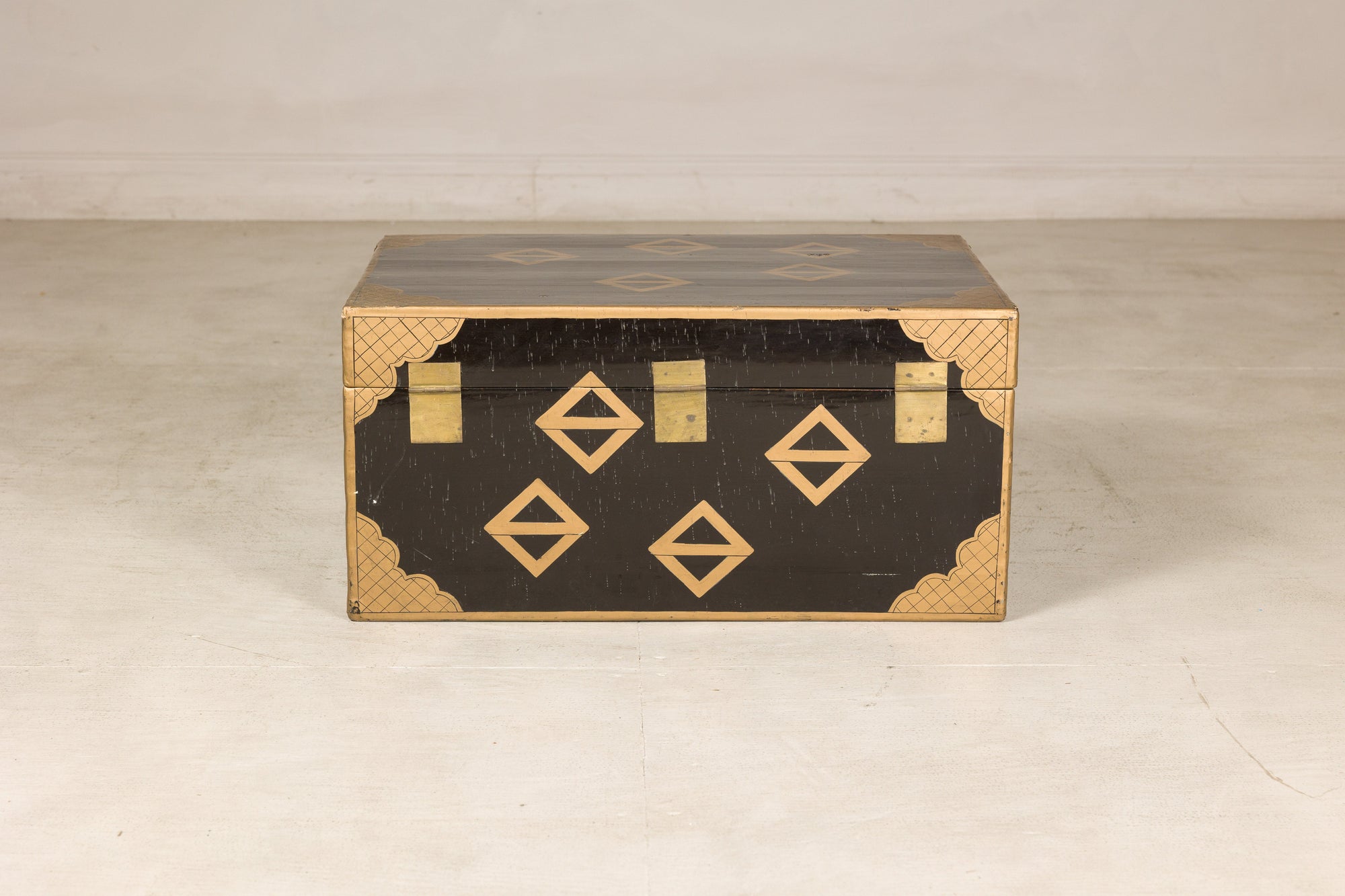 Rear view of vintage Chinese lacquered chest