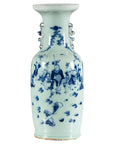 Blue and white porcelain Chinese vase with celadon glaze, cobalt floral and figure scenes, decorative handles, close-up.
