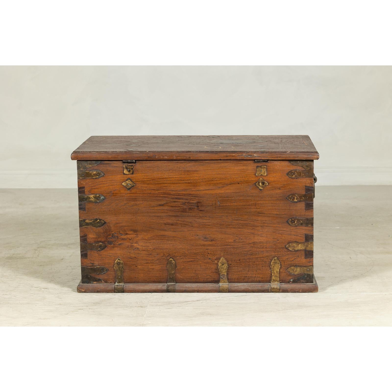 Antique Wooden Trunk with Ornamental Metalwork and Brass Hardware