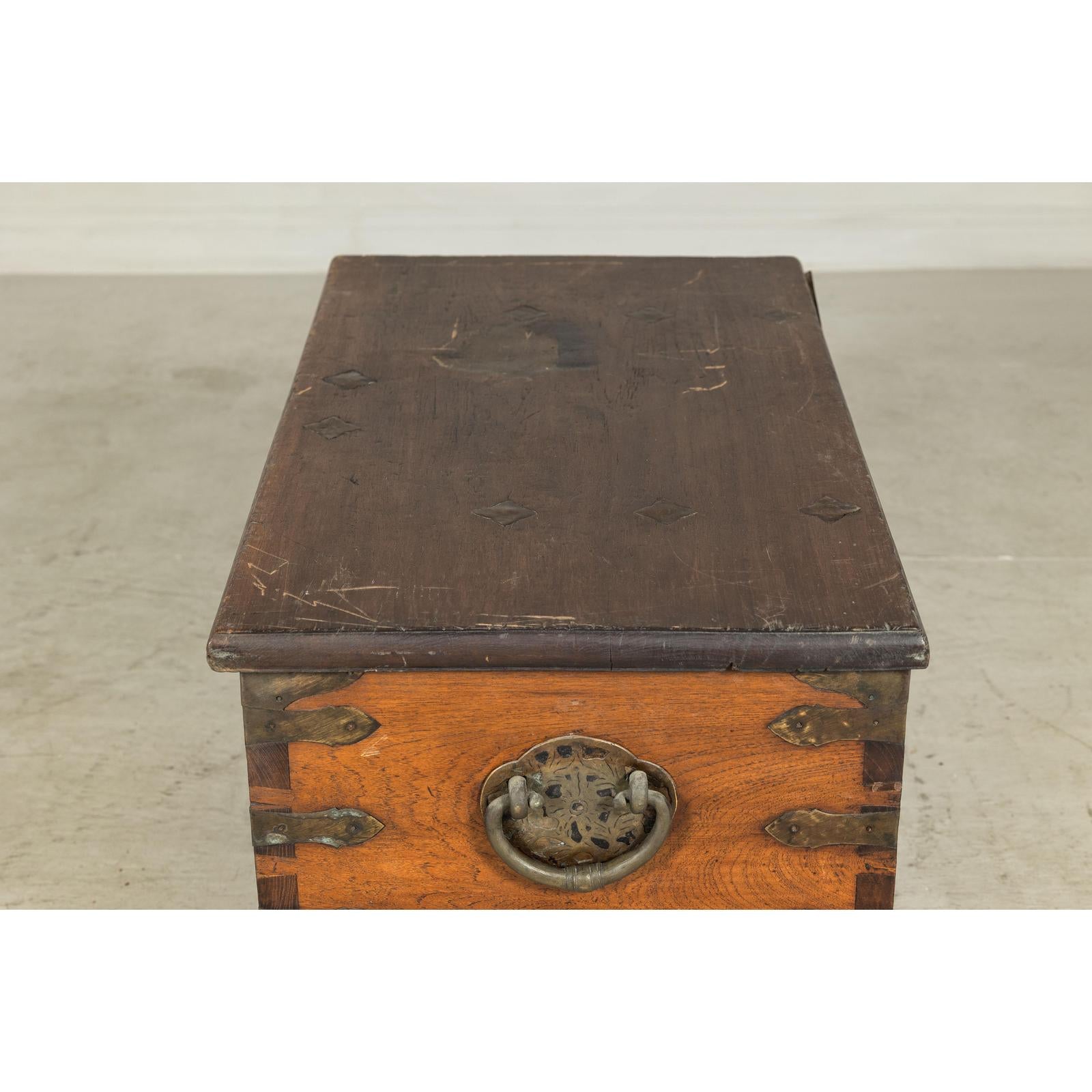 Antique Wooden Trunk with Ornamental Metalwork and Brass Hardware