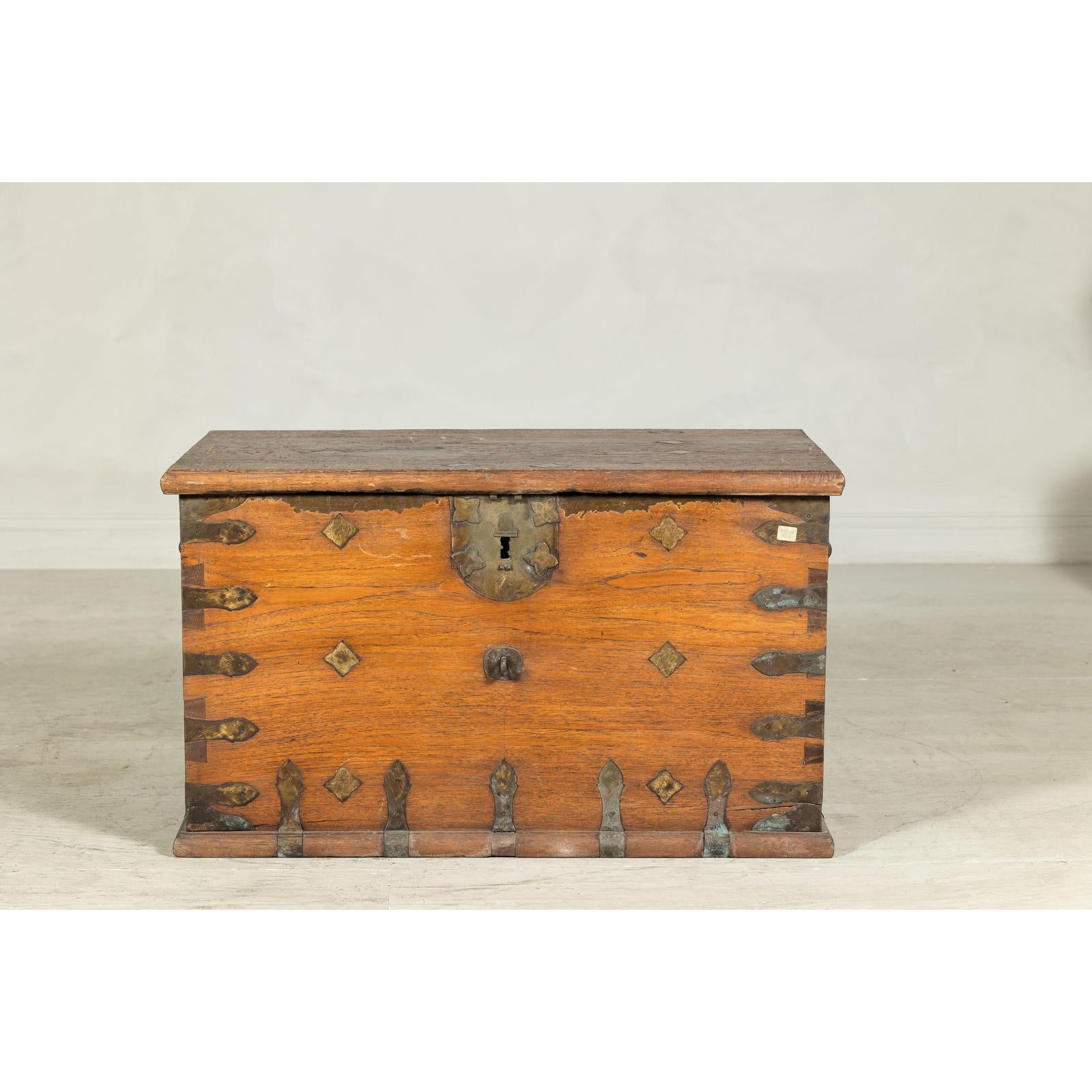 Antique Wooden Trunk with Ornamental Metalwork and Brass Hardware
