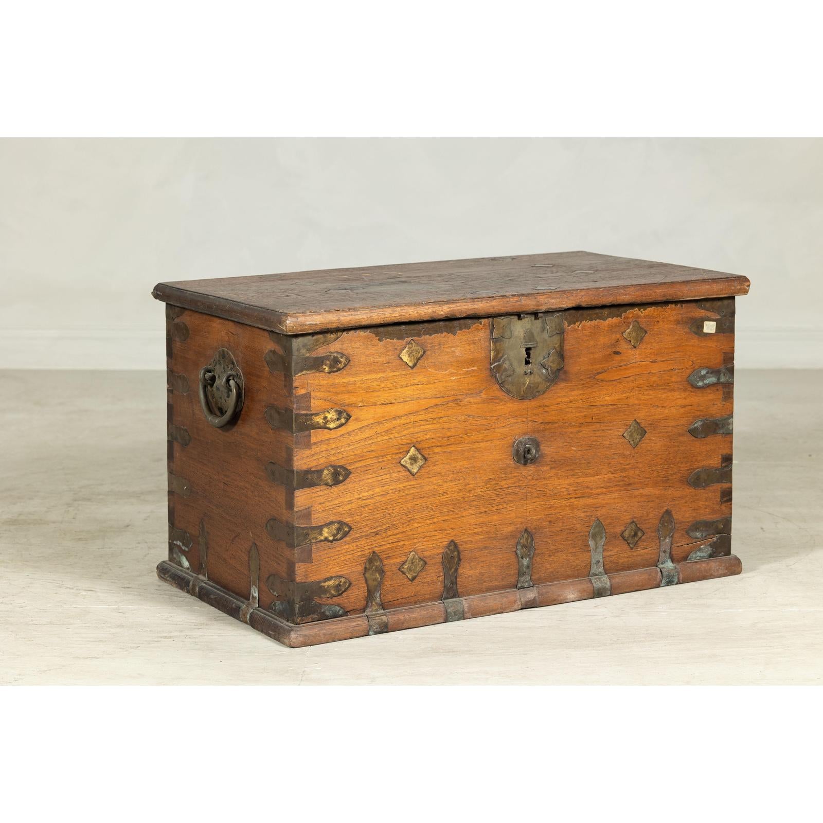 Antique Wooden Trunk with Ornamental Metalwork and Brass Hardware