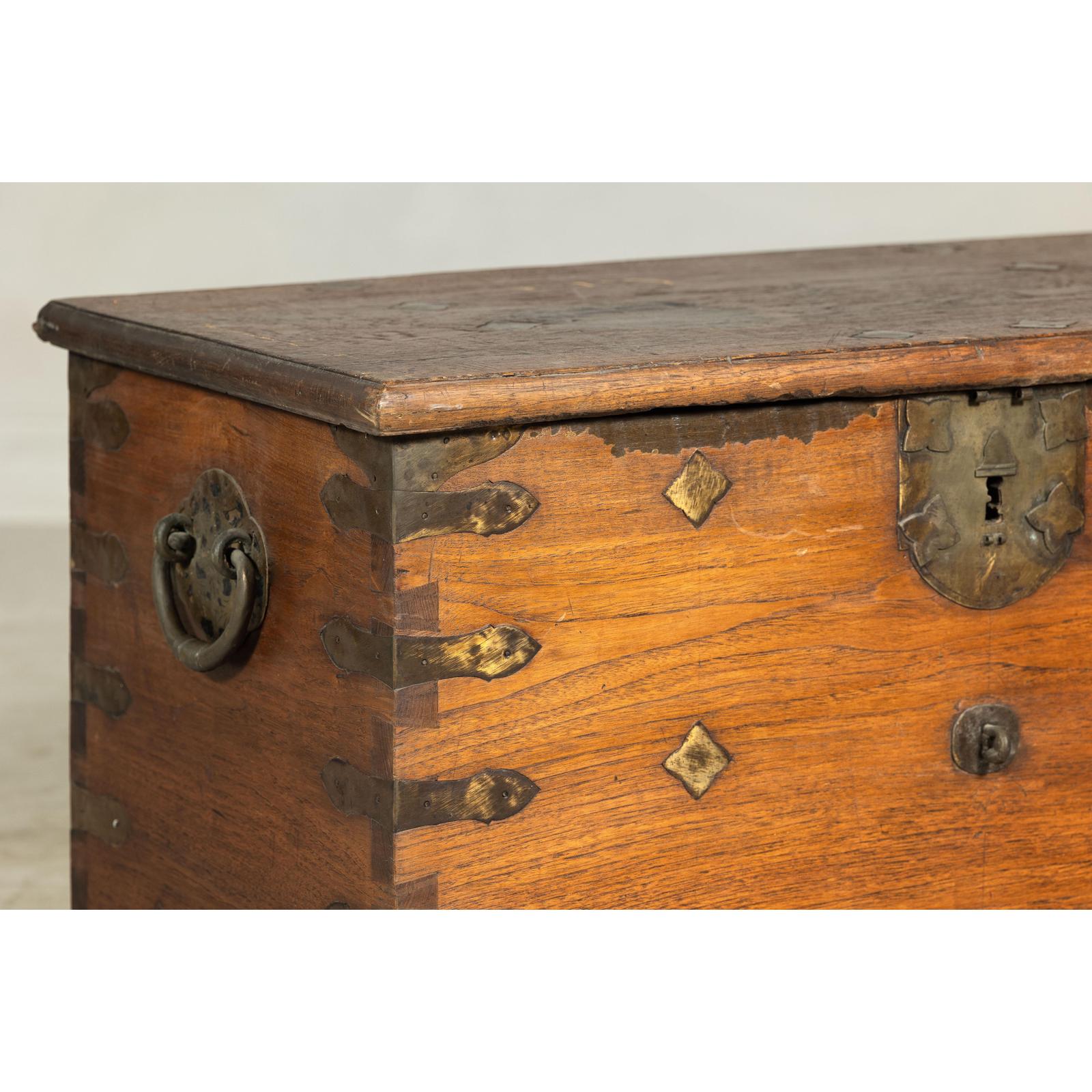 Antique Wooden Trunk with Ornamental Metalwork and Brass Hardware