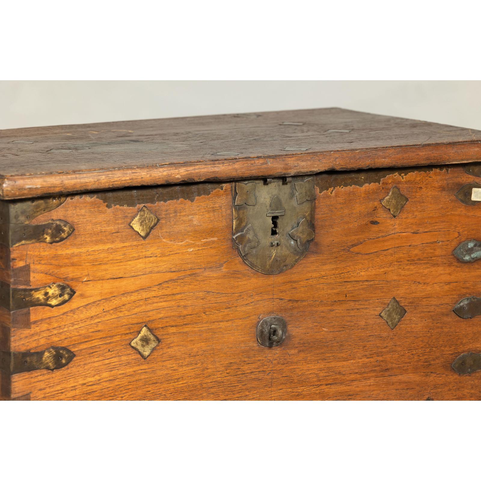 Antique Wooden Trunk with Ornamental Metalwork and Brass Hardware