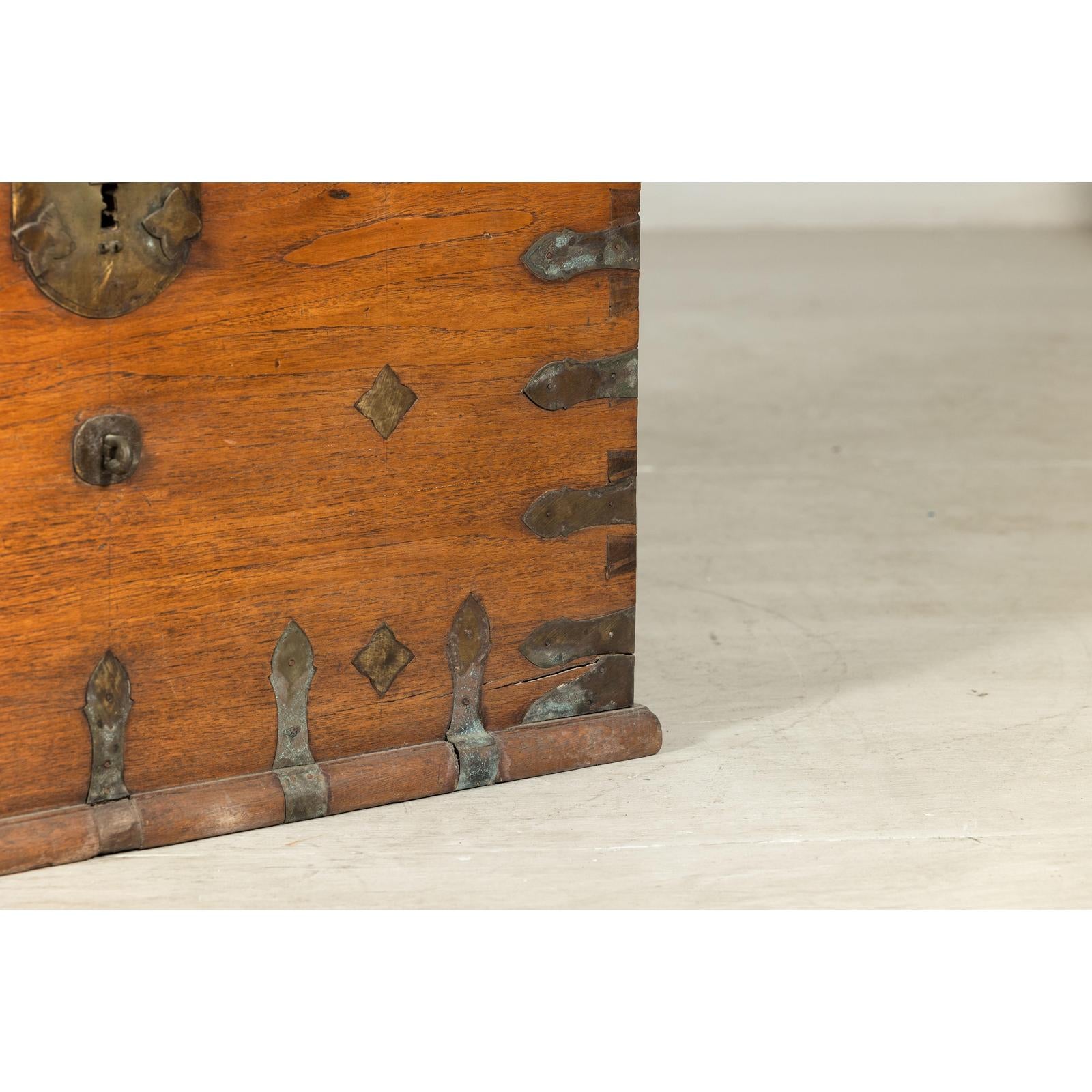 Antique Wooden Trunk with Ornamental Metalwork and Brass Hardware