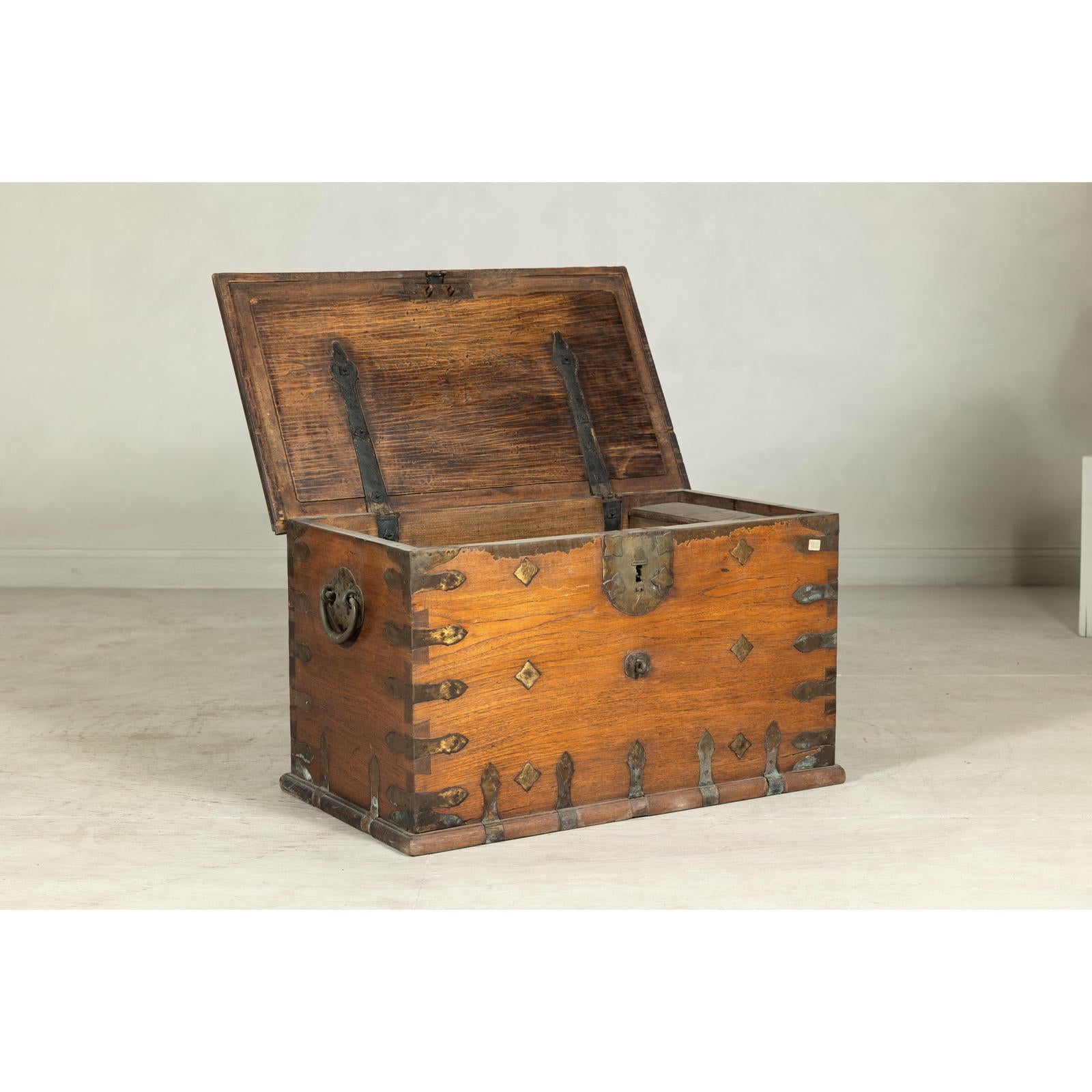 Antique Wooden Trunk with Ornamental Metalwork and Brass Hardware