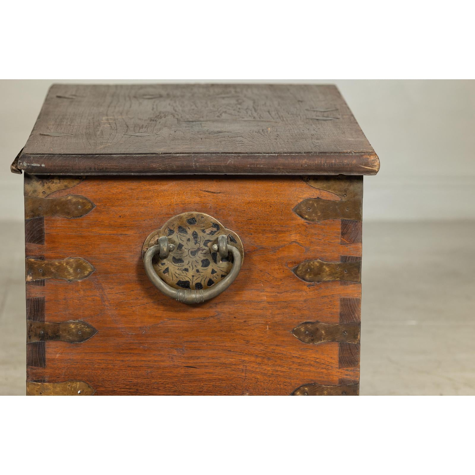 Antique Wooden Trunk with Ornamental Metalwork and Brass Hardware