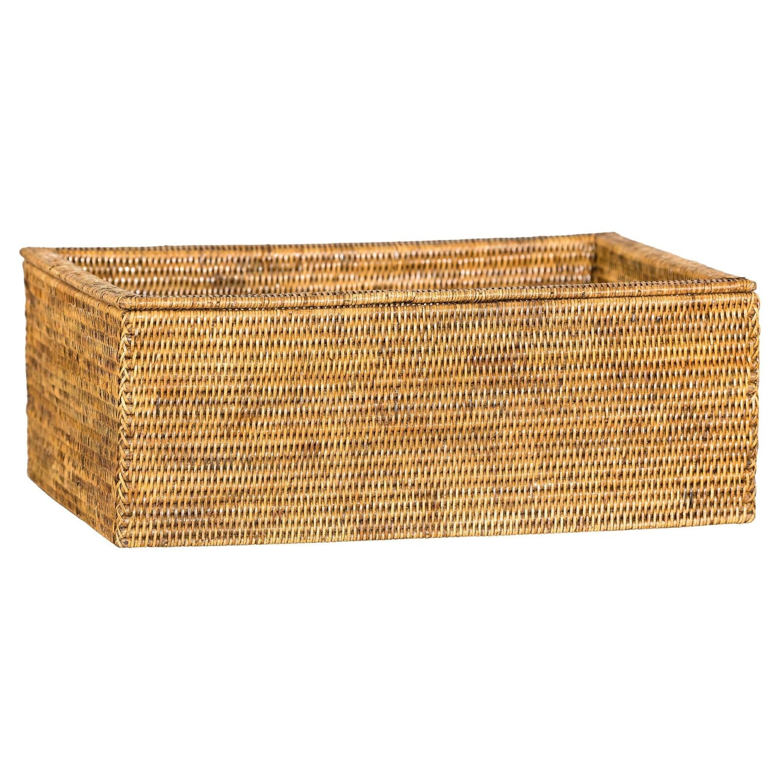 Brown rattan long rectangular storage box with lid, country style, on a white background.