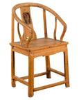 Brown elmwood Qing Dynasty chair with carved character medallion in traditional Asian style, 19th century.