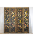Black lacquer four-panel screen with multicolor vintage floral patterns in yellow, red, orange, and white.