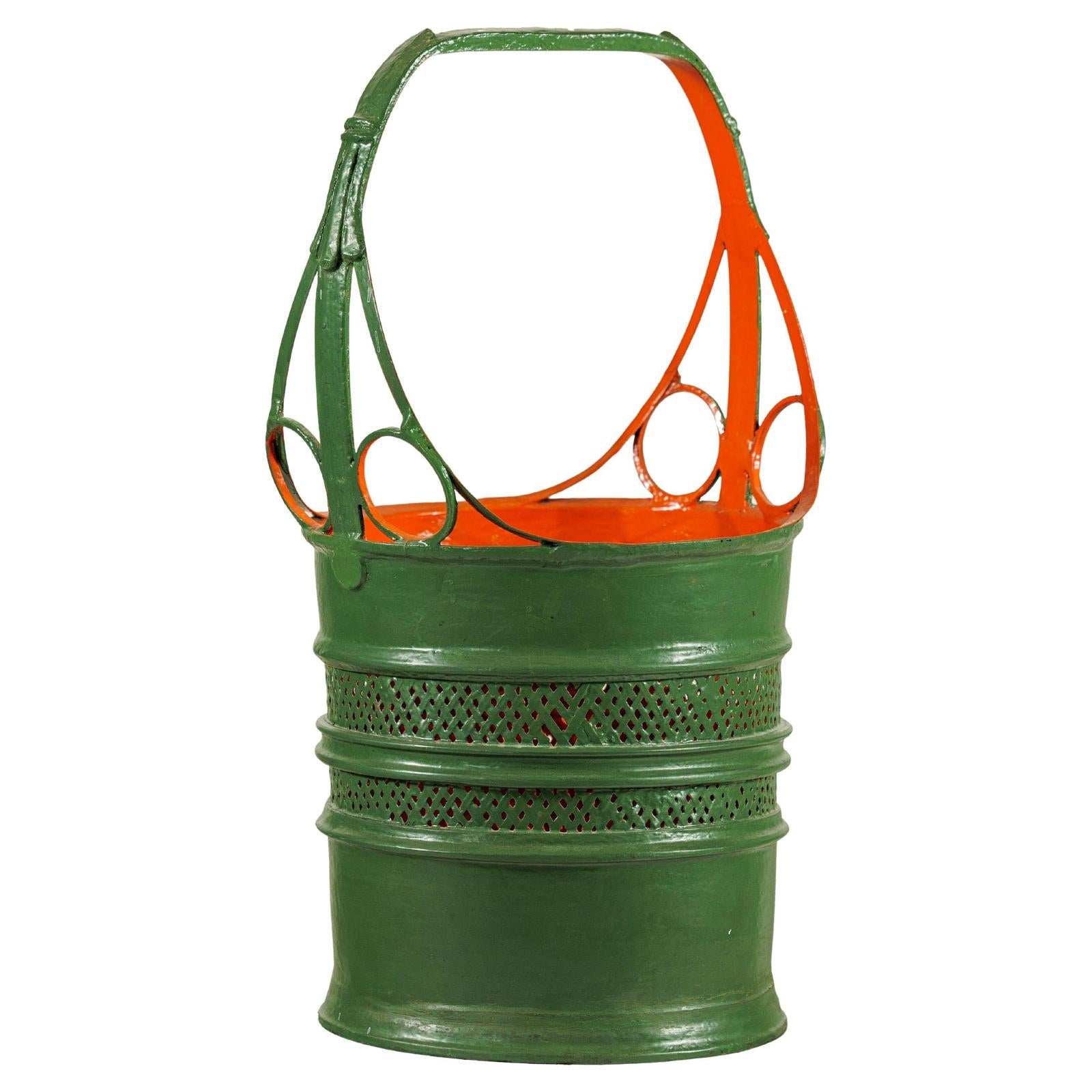 Green and Orange Antique Metal Basket with Openwork Design - image 1