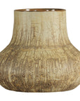 Close-up of a wide, round ceramic vase with textured cream and earth tones, rustic finish, and narrow top opening.