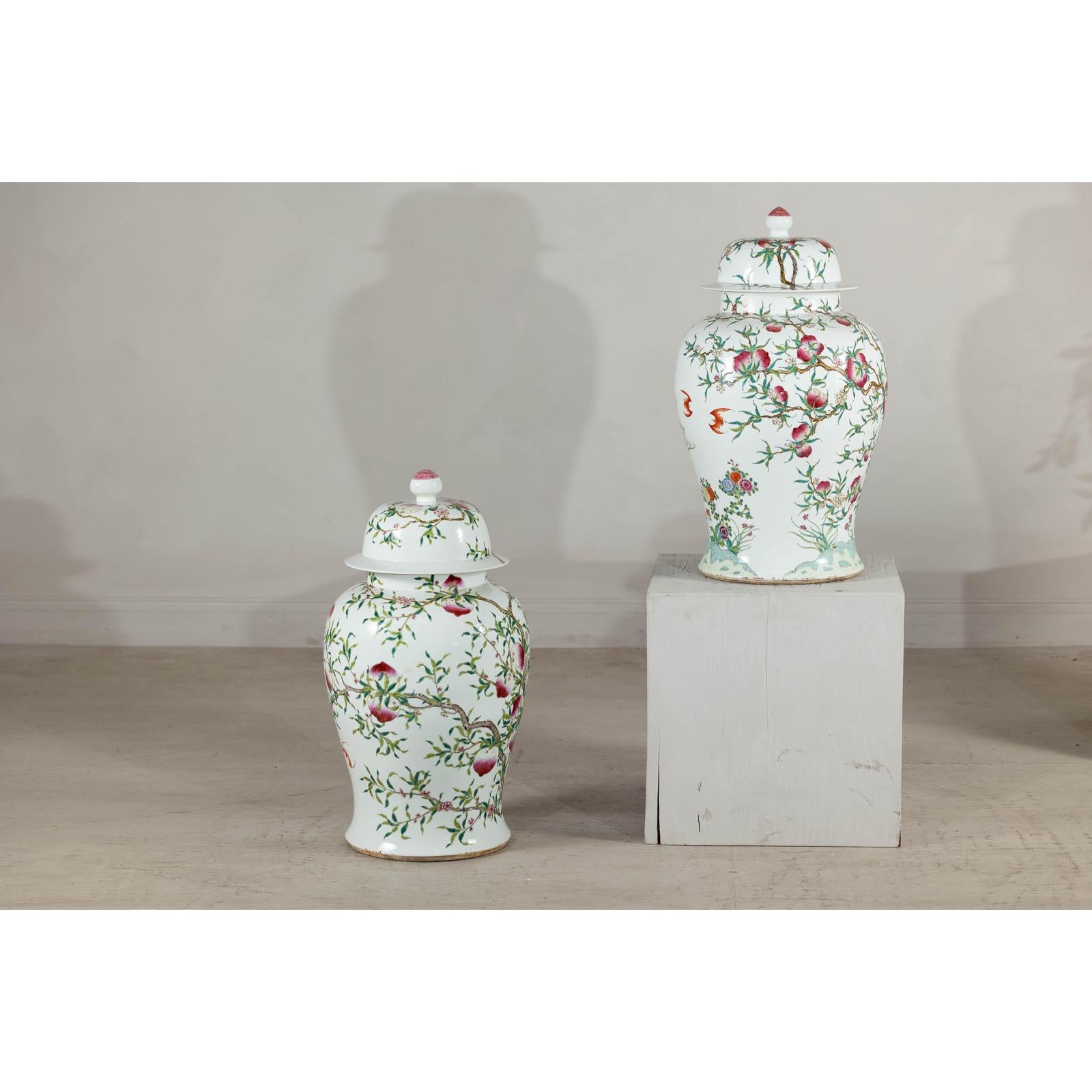 Near Pair of Famille Rose Ginger Jars with Peaches, Roses and Bats