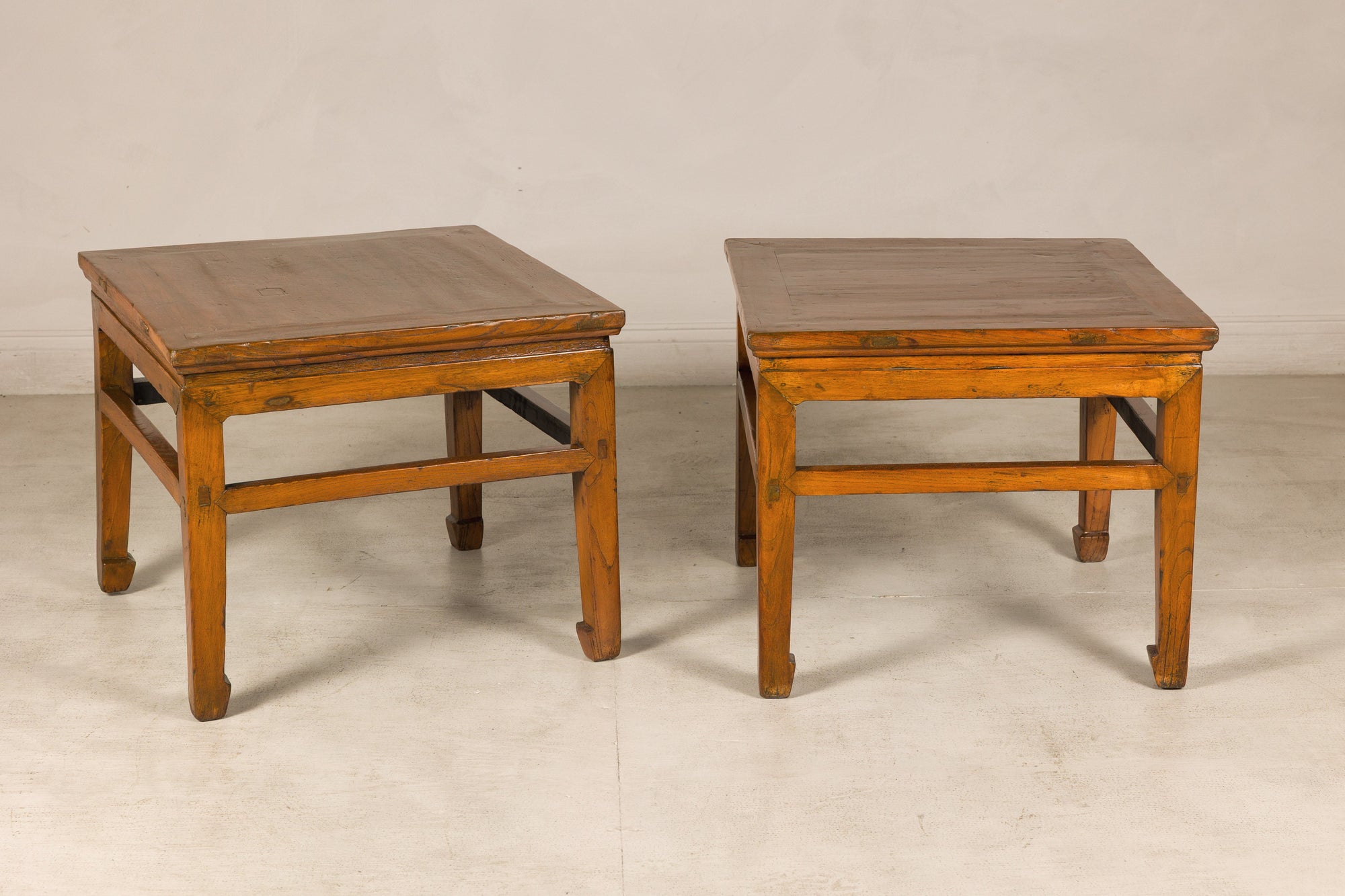 Pair of Qing dynasty side tables, angled view