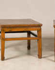 Pair of elm side tables, front view with one partly visible
