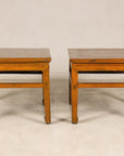 Pair of elm side tables shown at slightly different angles