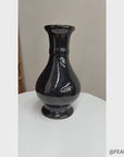 Dark Black Gloss Ceramic Vase with Baluster Silhouette