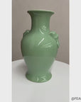 Guardian's Embrace Celadon Green Ceramic Vase Flared Rim