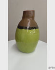 Round Pistachio Green Ceramic Vase with Brown Curved Top